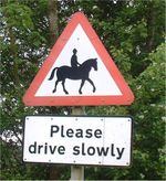 UK roadsign warning of horses and riders ahead