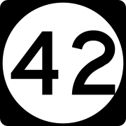 A circular highway shield for route 42