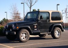 The Jeep Wrangler is a 4WD vehicle with a transfer case to select low range or high range 4WD.