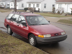 A 1993 Ford Escort station wagon, a modern automobile.