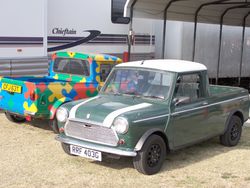 An Austin Mini pickup (right) and a Mini95 pickup (left).