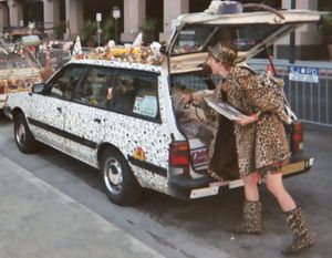 "Animal print" art car, with owner dressed in matching motif.