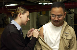 US navy personnel receiving influenza vaccination