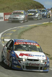 V8 Supercar Touring car racing, with New Zealand's Greg Murphy leading at Bathurst.