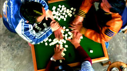 Shuffling of the Mahjong tiles is needed before piling around the table.