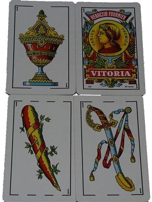 The four aces of the Spanish playing cards (naipes), as styled in the best-selling deck made by Heraclio Fournier. The palos (suits) are (left to right, top to bottom): copas (cups), oros (coins), bastos (batons) and espadas (swords). Notice the pattern of interruptions (la pinta) that identifies each suit in the horizontal line section of the card frames.