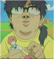 Overweight, unkempt, bespectacled and fantasizing about an anime heroine--a popular otaku stereotype.