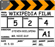 A plexiglass clapboard with scene details.