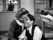 A scene from Jean Renoir's film, The Rules of the Game, exemplifies shallow focus. Note the out-of-focus figure in the background  best seen in the enlarged view of the image.