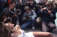 Starlets posing for photographers are a part of Cannes folklore.