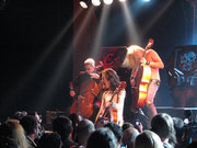 Apocalyptica in concert, cellist visible at left