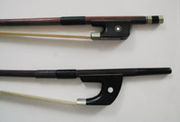 French (top) and German (bottom) double bass bows