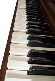 A player piano performing.