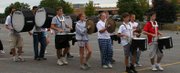 A practicing highschool drumline.