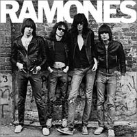 Ramones (L-R, Johnny, Tommy, Joey, Dee Dee) on the cover of their self-titled debut album (1976), wearing leather jackets, Converse All-Stars and torn drainpipe jeans.