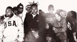 The pioneering group, Wu-Tang Clan. Left to right: Raekwon, Masta Killa, Method Man, Ghostface Killah (back) and Ol' Dirty Bastard (front), Inspectah Deck (standing) and GZA (kneeling), U-God, and The RZA