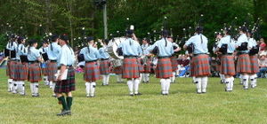 The Simon Fraser University Pipe Band, winner of 4 World Pipe Band Championships in the past decade, in competition at the 2005 Bellingham Highland Games.