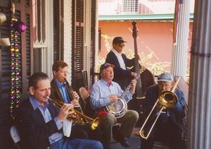 A traditional jazz band plays for a party in New Orleans in 2005. Shown are Chris Clifton, trumpet; Brian O'Connell, clarinet; Les Muscutt, banjo; Chuck Badie, string bass; and Tom Ebert, trombone. Other instruments often found in this type of band are the piano and drums.