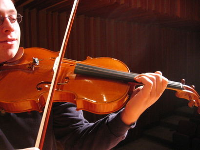 Playing the viola. This is a 17" viola.