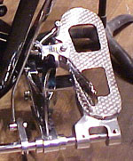 This pedal is on a Dresden timpano. The timpanist must disengage the clutch  seen here on the left of the pedal  to change the pitch of the drum.